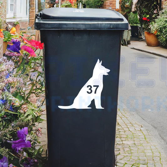 Personalised German Shepherd wheelie bin sticker showing a German Shepherd silhouette with cut-out house number on a bin outside a UK home by Pixel Printworks