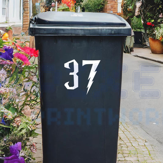 Personalised magical wizard wheelie bin sticker showing custom house number in wizard-style font on a bin outside a UK home by Pixel Printworks