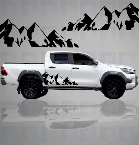 Toyota Hilux with mountain silhouette vinyl decals by Pixel Printworks