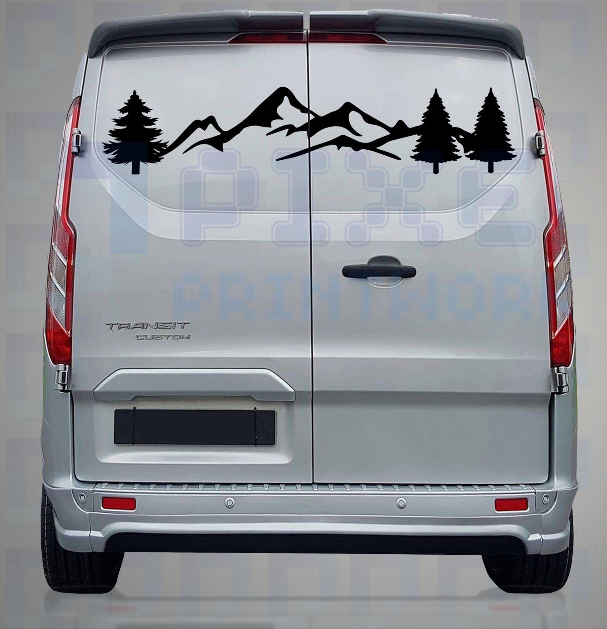 Mountains and pine trees vinyl decal on rear window of a campervan – black silhouette graphic