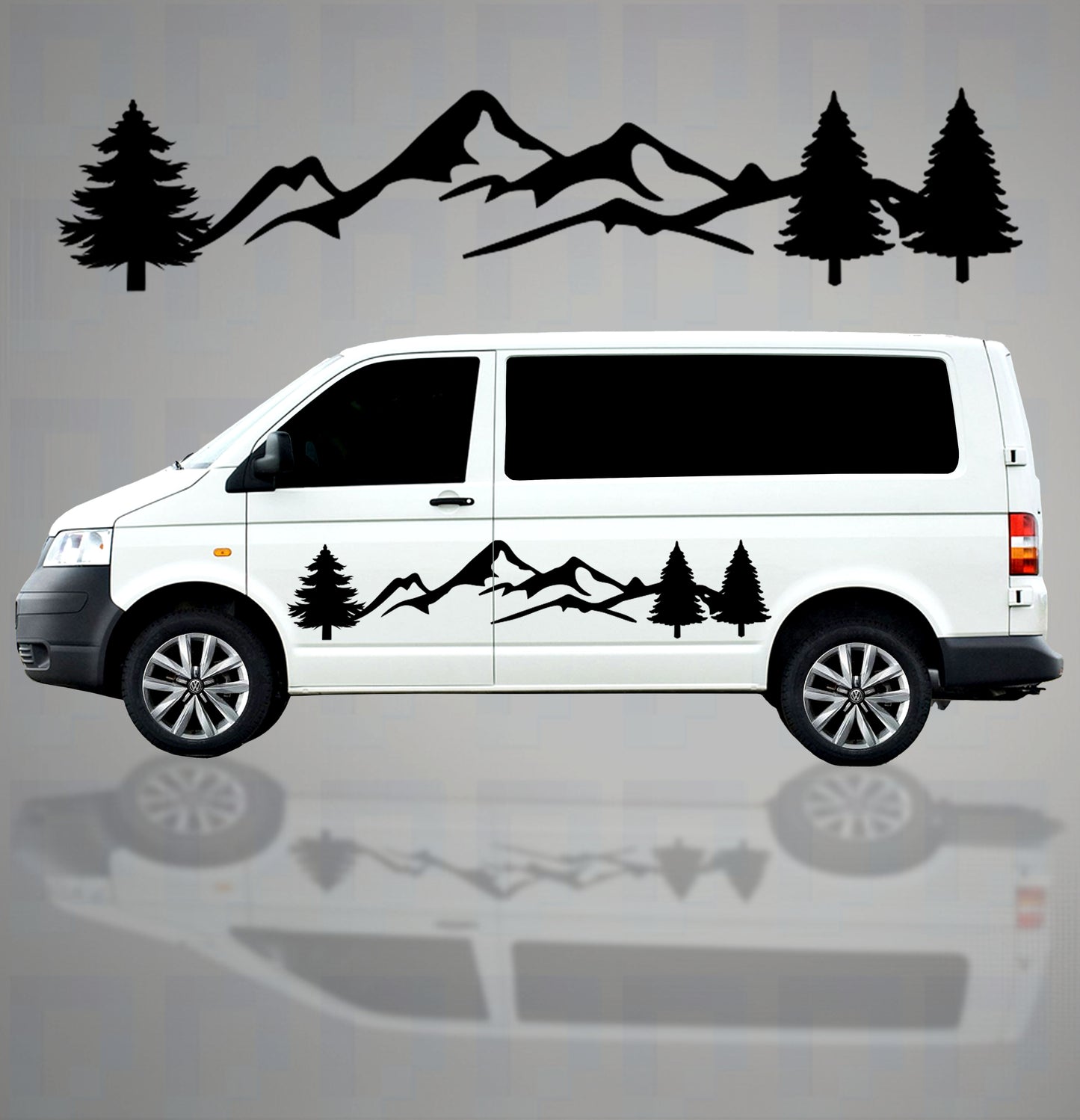Black mountains and 3 trees vinyl decal on the side of a short wheel base campervan