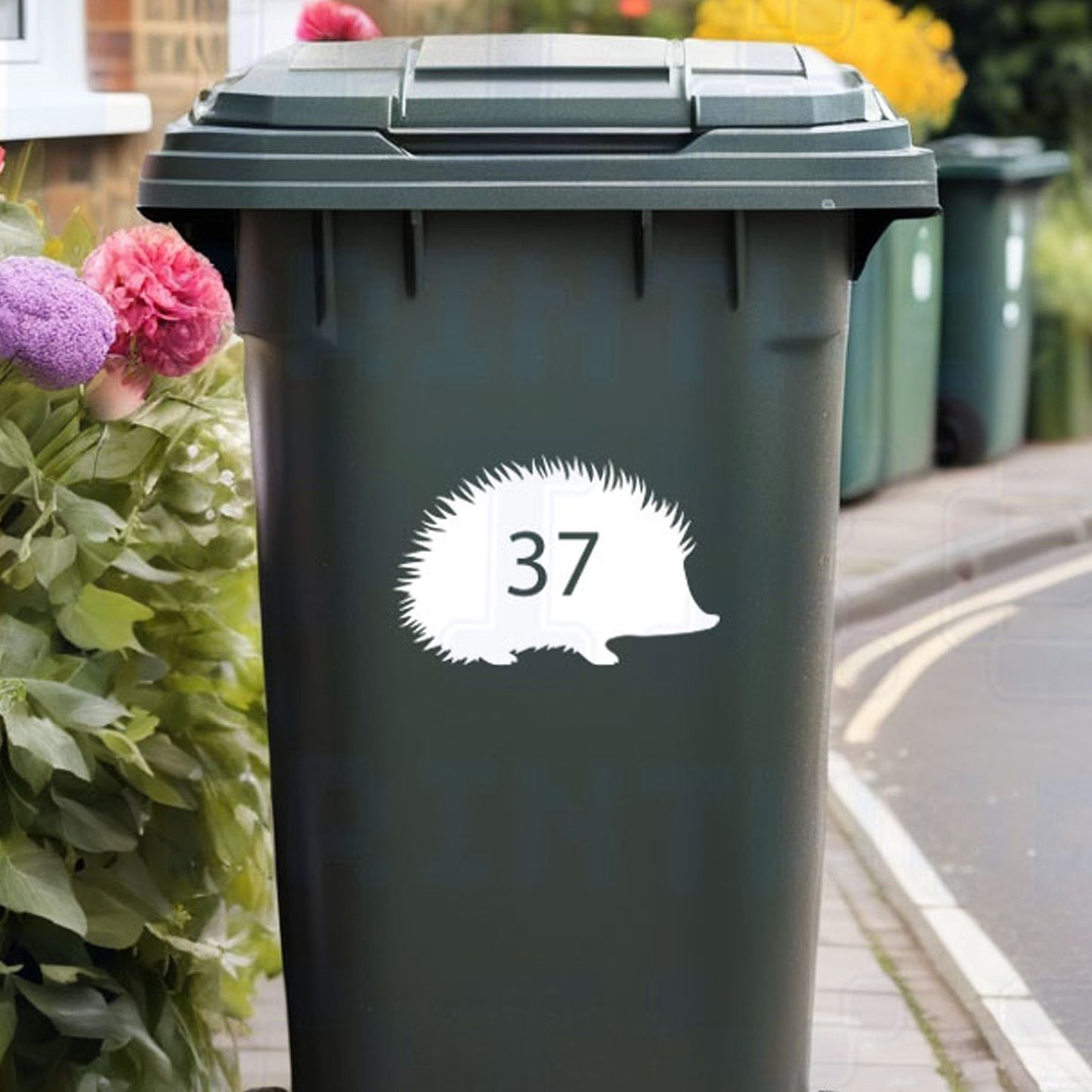 Personalised hedgehog wheelie bin sticker showing cute hedgehog silhouette with cut-out house number on a bin outside a UK home by Pixel Printworks