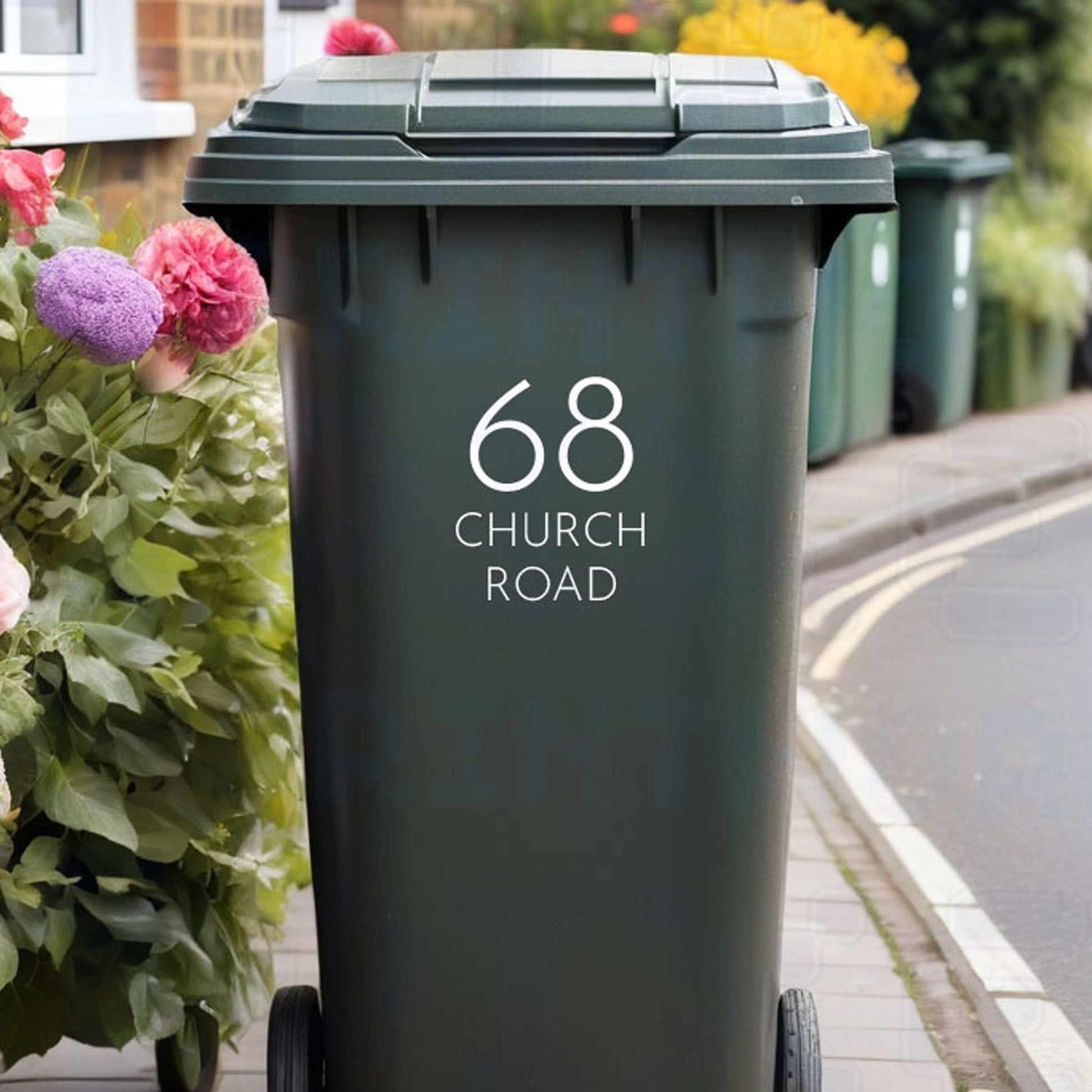 Personalised modern wheelie bin sticker showing minimalist house number and street name with no dividing lines on a bin outside a UK home by Pixel Printworks