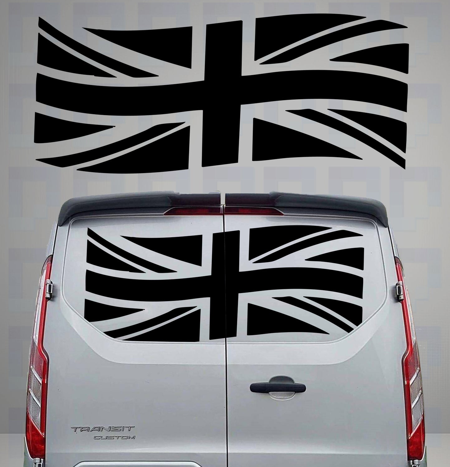 Waving Union Jack vinyl decal applied to the rear doors of a grey Transit van