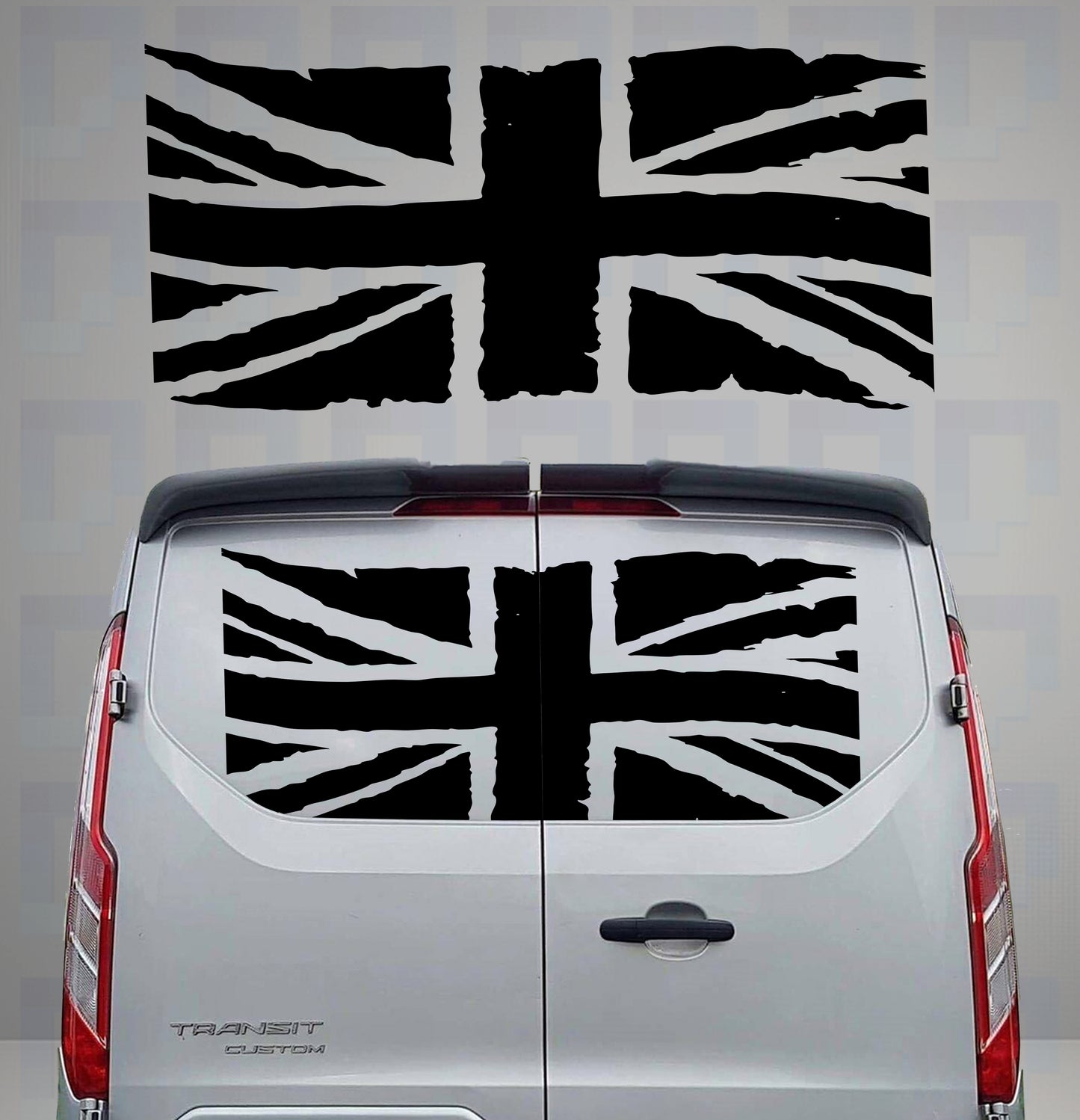 Distressed Union Jack vinyl decal with rough brush-stroke design on the rear doors of a grey van
