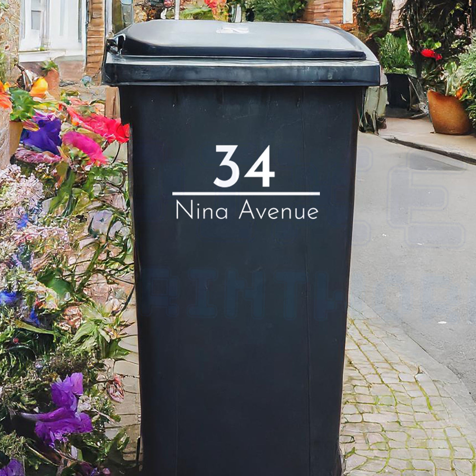 Personalised classic wheelie bin sticker showing house number and street name with a clean dividing line on a bin outside a UK home by Pixel Printworks